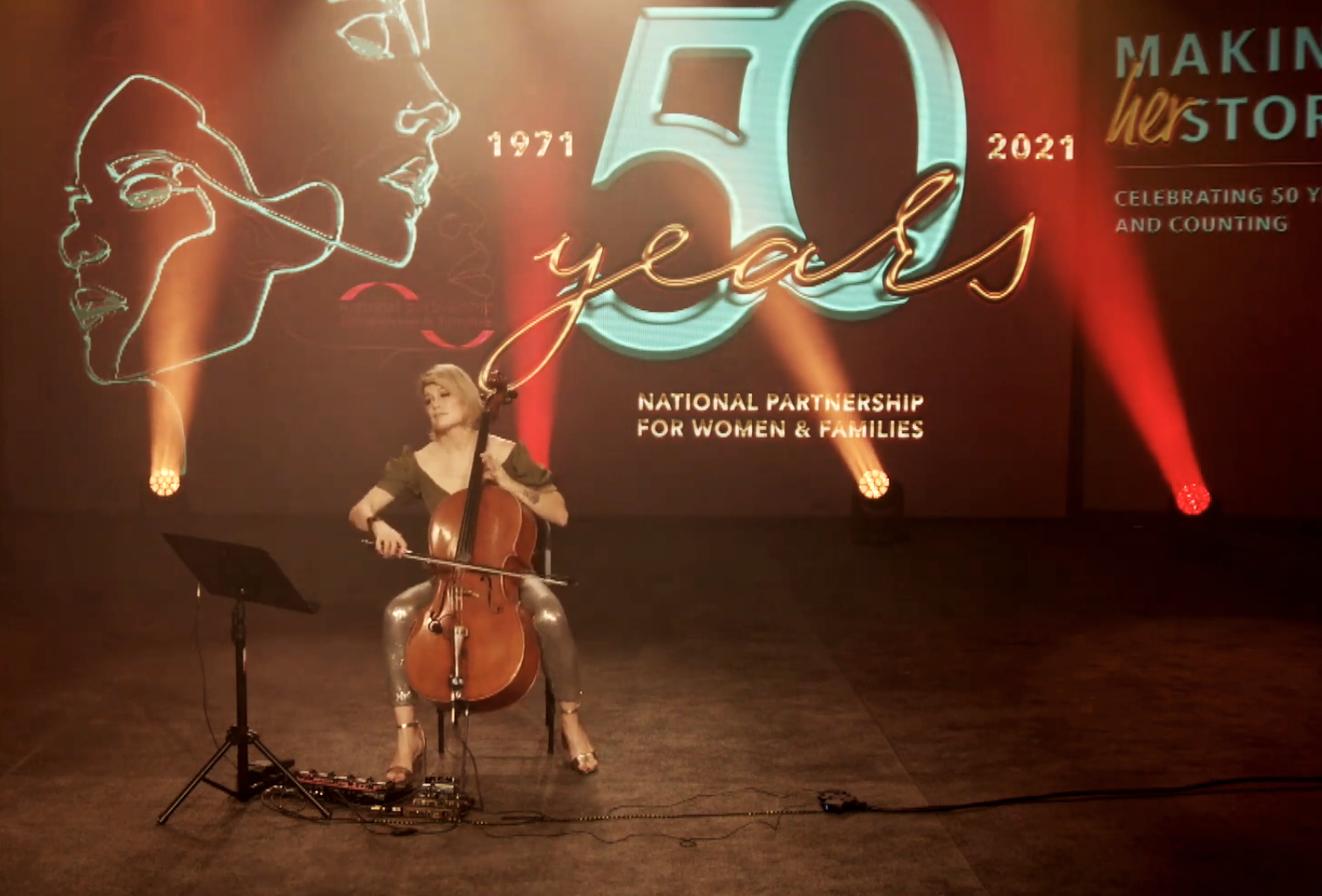 Cellist Jenn Cornell performing using her cello at the 2021 Annual Gala